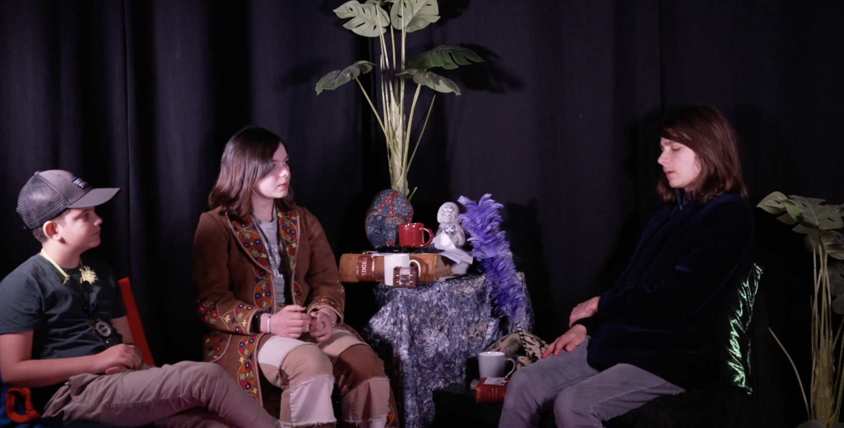 Young filmmaker operating a camera at an Offshoot workshop in Norwich